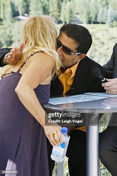 Dr. Deepak Chopra greets Goldie Hawn, actress and founder of the Hawn Foundation, during a radio interview at The 2009 Aspen Health Forum Presented...