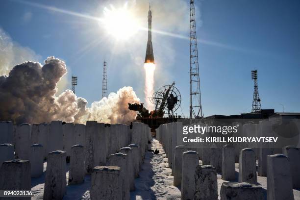Russia's Soyuz MS-07 spacecraft, carrying members of the International Space Station expedition 54/55, blasts off to the ISS from the launch pad at...