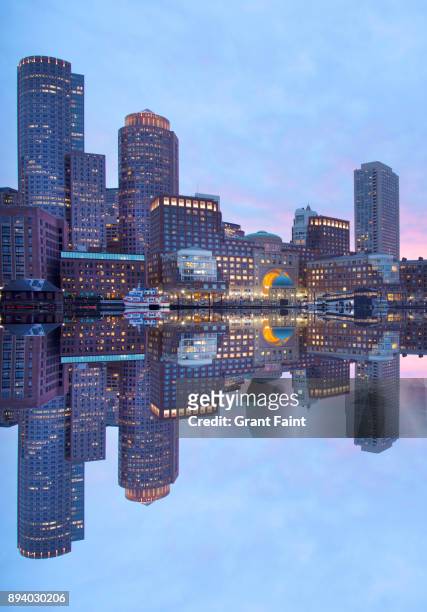 a reflected view of boston harbour. - boston seaport stockfoto's en -beelden