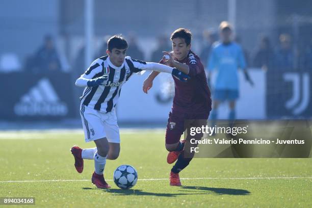 Player of Juventus U15 and player of Torino FC U15 compete during the match between Juventus U15 and Torino FC U15 at Juventus Center Vinovo on...