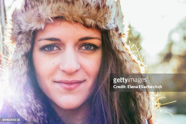 young woman wearing hat - eliachevitch stock pictures, royalty-free photos & images