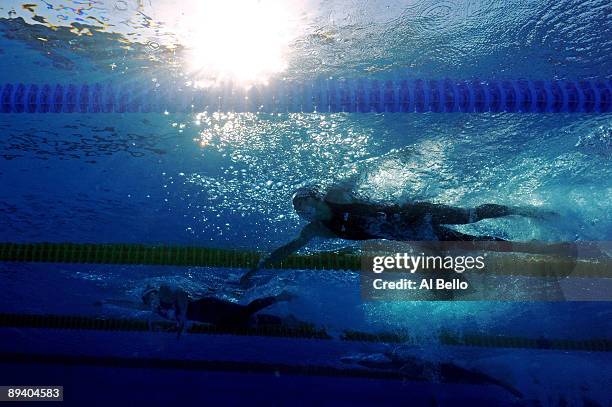 Paul Biedermann of Germany leads Michael Phelps of the United States and goes on to win the Men's 200m Freestyle Final during the 13th FINA World...