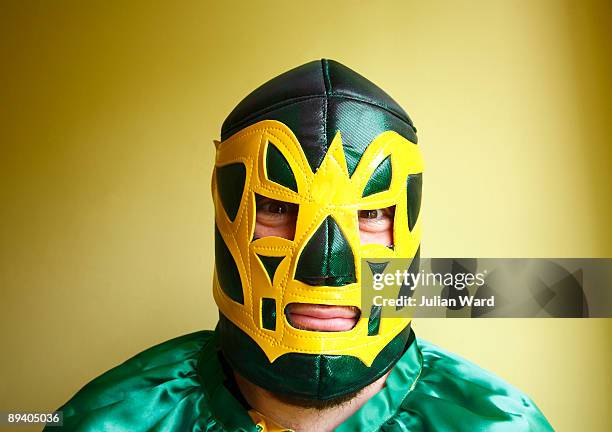 mexican wrestler looking straight at camera - men wrestling stock pictures, royalty-free photos & images