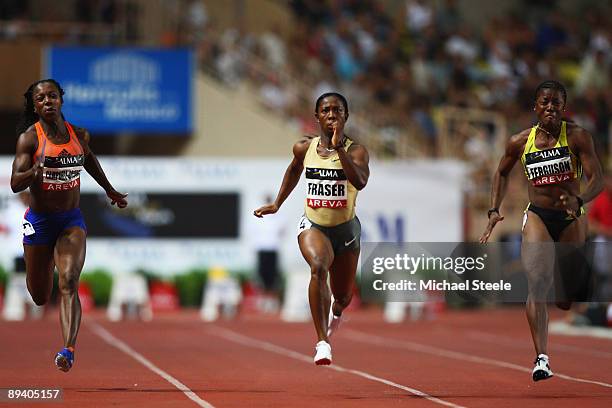 Shelly-Ann Fraser of Jamaica wins the women's 100m from Debbie Ferguson McKenzie of Bahamas and Veronica Campbell-Brown of Jamaica during the Iaaf...