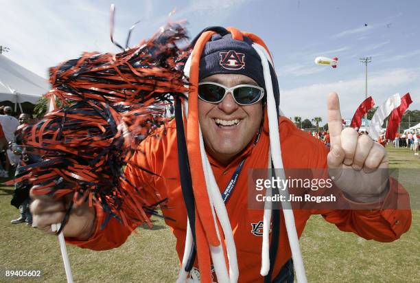 Fan of the Auburn Tigers demonstrate their support before a game Wisconsin in the Capital One Bowl at the Florida Citrus Bowl Stadium, Orlando,...