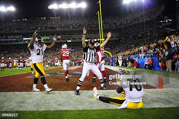 Super Bowl XLIII: Pittsburgh Steelers Santonio Holmes sitting out of bounds after making game winning touchdown catch vs Arizona Cardinals during 4th...