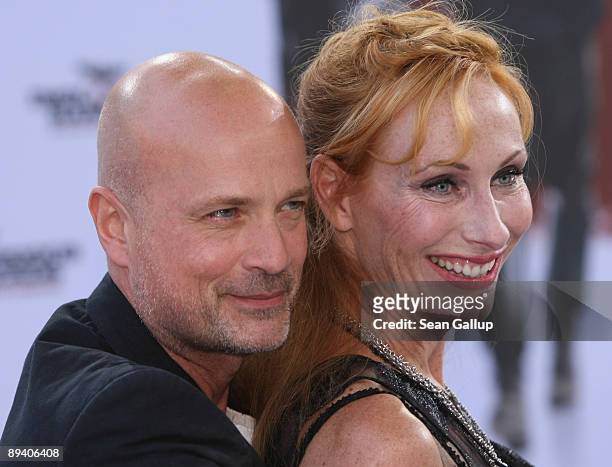 Actress Andrea Sawatzki and her husband, actor Christian Berkel, attend the German premiere of "Inglourious Basterds" on July 28, 2009 in Berlin,...