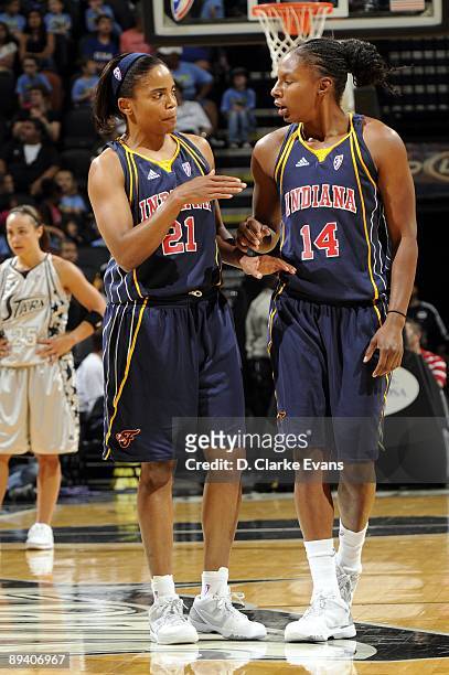 Tamecka Dixon and Eshaya Murphy of the Indiana Fever talk during the game against the San Antonio Silver Stars at AT&T Center on July 23, 2009 in San...