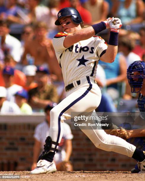 Jeff Bagwell of the Houston Astros bats during an MLB game versus the Chicago Cubs at Wrigley Field in Chicago, Illinois. Bagwell played for the...