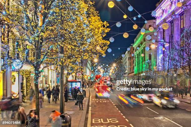 christmas shopping, london, oxford street. - daily life at oxford street london stock pictures, royalty-free photos & images