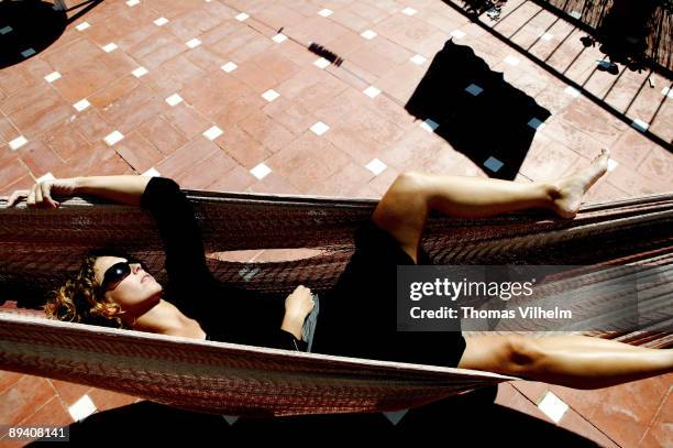 Woman in hammock.