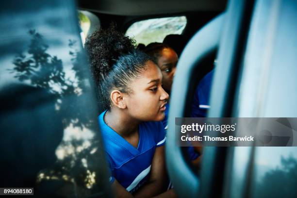 young cheerleaders sitting in the back for car before going to practice - black cheerleaders stock pictures, royalty-free photos & images