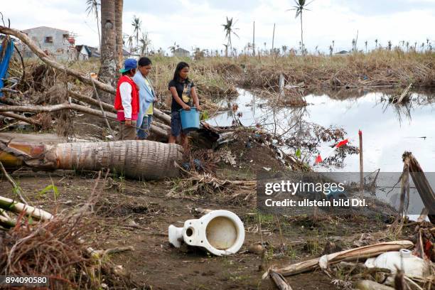 Typhoon Haiyan leaves a trail of destruction and death in Tacloban. Almost three weeks after the disaster thousands of bodies stil need to be...