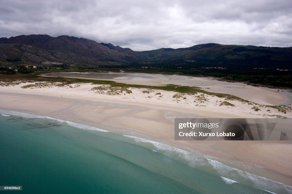 Beach of Carnota and Pool of Caldabarcos. In the back, Monte Pindo in the Costa da Morte. .A Coruna. Galicia.