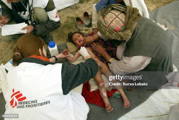March 2002, Baghlan, Earthquake in old town Narhin in Baghlan Afganistan Victim attended by doctor