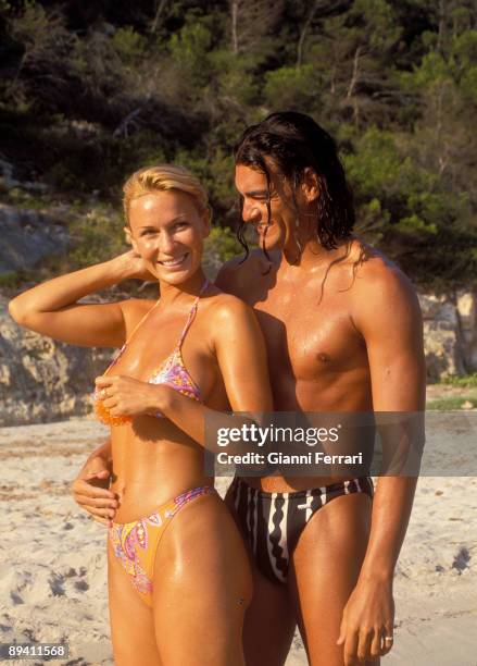 August 11, 1998. Menorca, Spain. The french vedette, Marlene Mourreau, with your boyfriend, Michael Guevara, of holidays in the island of Minorca.