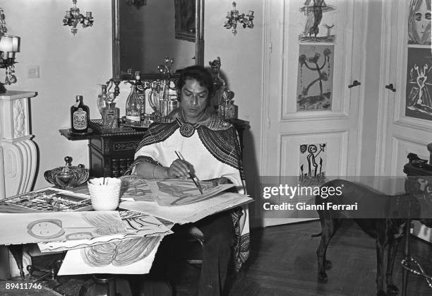 Portrait of Antonio Ruiz, flamenco dancer, painting in his house in Madrid, Spain.