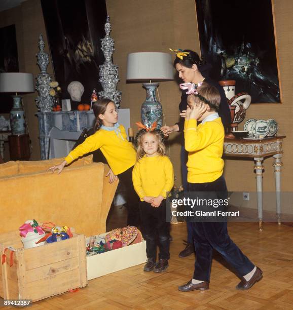 Madrid , Spain. The actress Lucia Bose prepares the Christmas decoration with her children Lucia, Miguel and Paola in her house of Somosaguas.