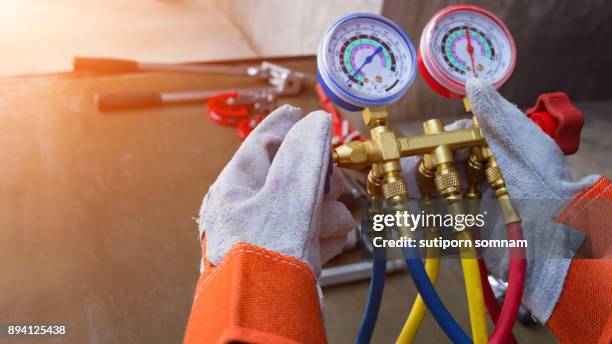 gauge or meter tools for repairing air - hvac repair stock pictures, royalty-free photos & images