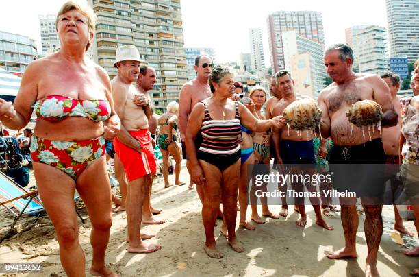 Benidorm. Alicante. Pensioners on the beach Levante.