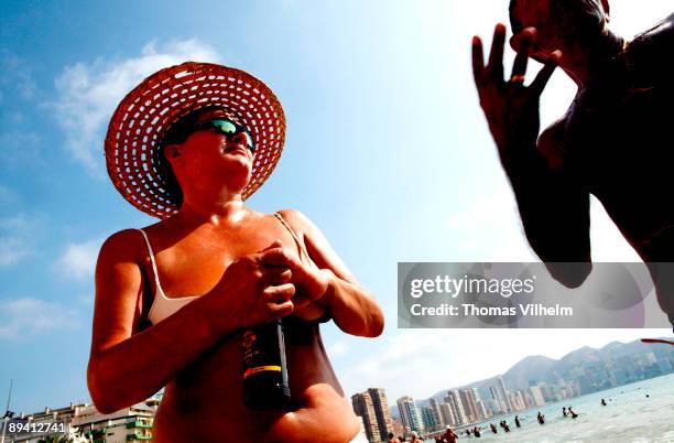 Benidorm. Alicante. Pensioners on the beach Levante.