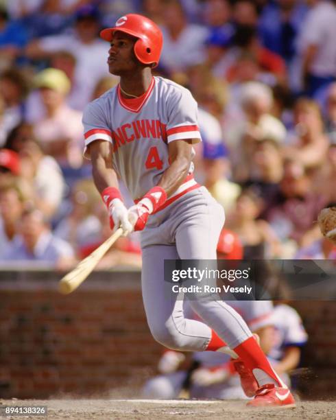 Eric Davis of the Cincinnati Reds bats during an MLB game at Wrigley Field in Chicago, Illinois during the 1986 season.