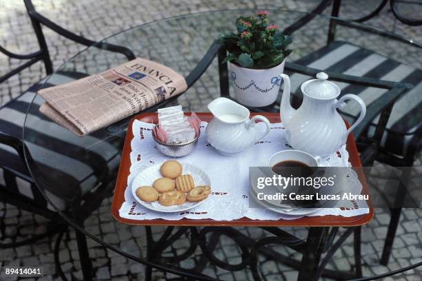 Lisbon. Portugal. Hotel 'The Janelas Green'. Breakfast in a terrace in the open air.