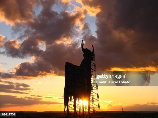 Toro de Osborne. Sunset lanscape with the Osborne bull in the field of Zamora. Castile and Leon.