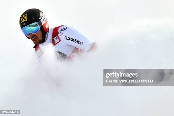 Austria's Marcel Hirscher wins the FIS Alpine World Cup Men's Giant Slalom, on December 17, 2017 in Alta Badia, Italian Alps. / AFP PHOTO / Vincenzo...