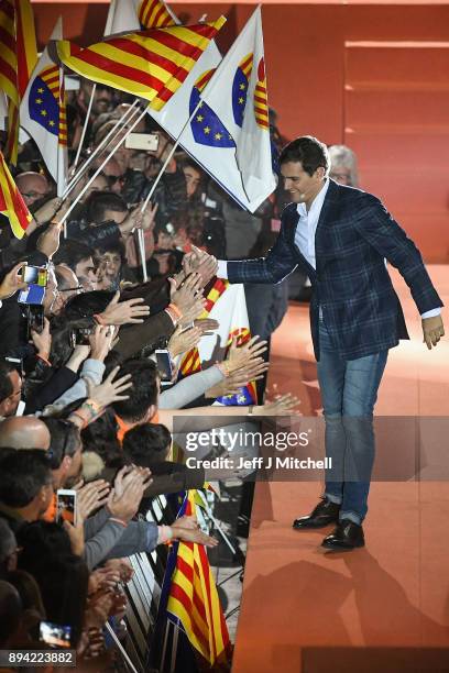 Leader of the center right party Ciudadanos, Albert Rivera, addresses a rally ahead of the forthcoming Catalan parliamentary election on December 17,...