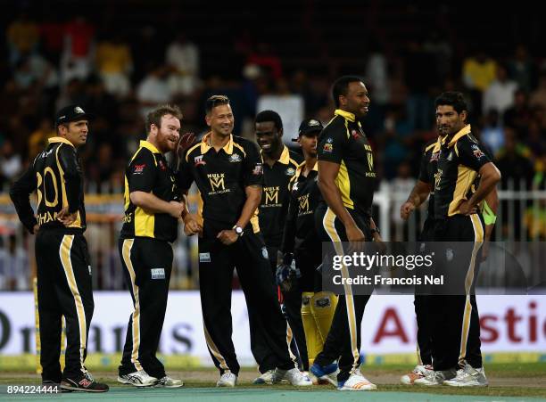 Players of kerela Kings celebrates after dismissing Alex Hales of aratha Arabians during the T10 League semifinal match between Kerela Kings and...