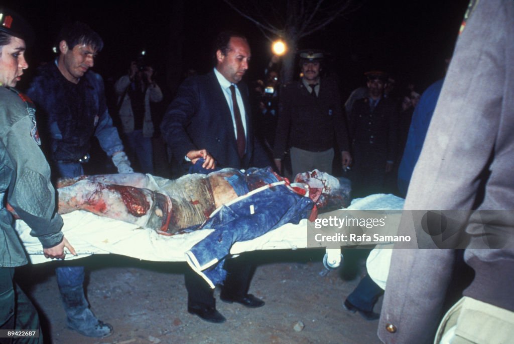 April 12, 1985. Madrid (Spain). Terrorist attack against the restaurant 'El Descanso' Firemen and members of the Red Cross carry a dead man in a stretcher. This terrorist attack against military men of the North American base of Torrejon was attributed to