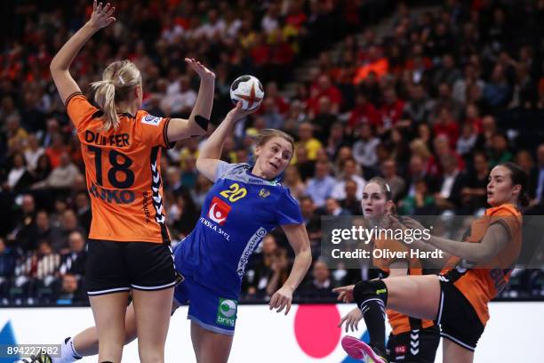 Kelly Dulfer of Netherlands and Isabelle Gullden of Sweden challenges for the ball during the IHF Women's Handball World Championship 3rd place match...