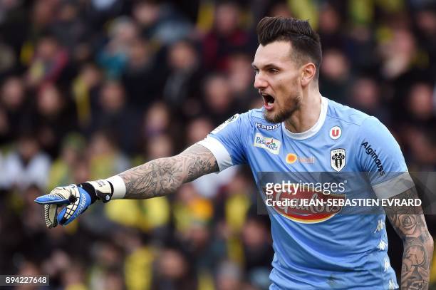 Angers' French goalkeeper Alexandre Letellier reacts during the French L1 football match between Nantes and Angers at Beaujoire Stadium in Nantes,...
