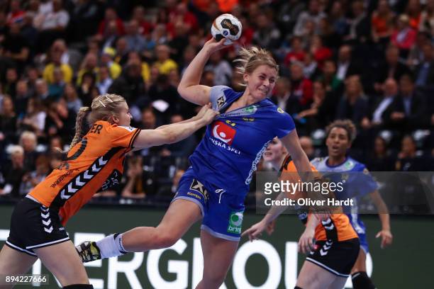 Danick Snelder of Netherlands and Isabelle Gullden of Sweden challenges for the ball during the IHF Women's Handball World Championship 3rd place...
