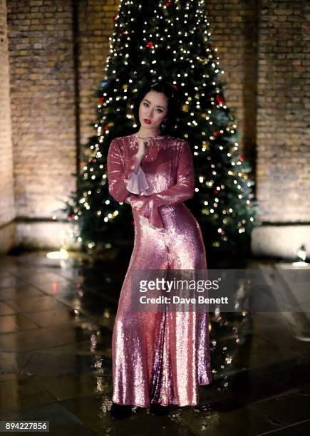 Betty Bachz wearing Temperly dress and Sophia Webster shoes on December 16, 2017 in London, England.