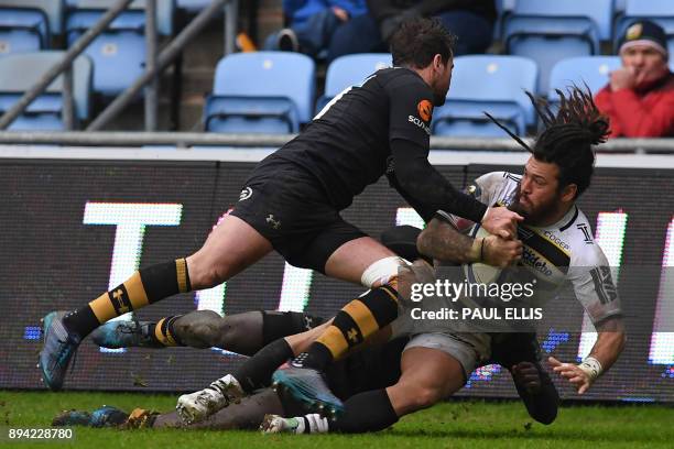 La Rochelle's New Zealand wing Rene Ranger is tackled during the European Rugby Champions Cup pool 1 rugby union match between Wasps and La Rochelle...