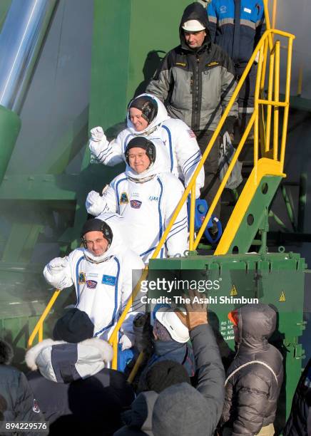 Expedition 54 flight engineer Scott Tingle of NASA, top, flight engineer Norishige Kanai of Japan Aerospace Exploration Agency , middle, and Soyuz...