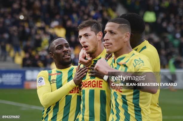 Nantes' Argentinian forward Emiliano Sala celebrates with his teammates after scoring a penalty during the French L1 football match between Nantes...