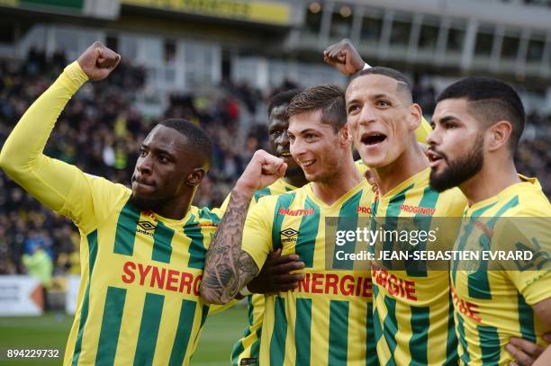 Nantes' Argentinian forward Emiliano Sala celebrates with his teammates after scoring a penalty during the French L1 football match between Nantes...