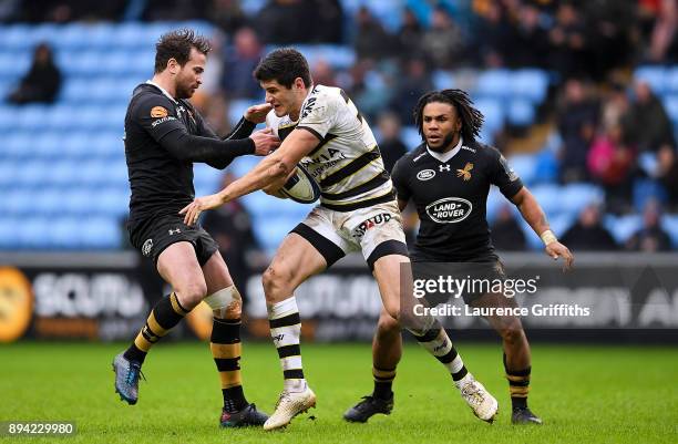 Pierre Boudehent of La Rochelle is tackled by Danny Cipriani of Wasps during the European Rugby Champions Cup match between Wasps and La Rochelle at...