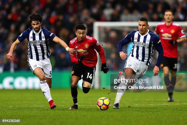 Jesse Lingard of Manchester United, Claudio Yacob and Jake Livermore both of West Bromwich Albion, in action during the Premier League match between...