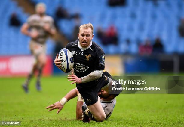 Dan Robson of Wasps is tackled by Victor Vito of La Rochelle during the European Rugby Champions Cup match between Wasps and La Rochelle at Ricoh...