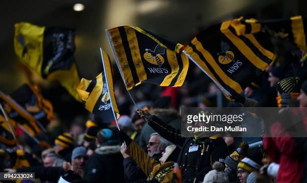 Wasps fans cheer on their team during the European Rugby Champions Cup match between Wasps and La Rochelle at Ricoh Arena on December 17, 2017 in...