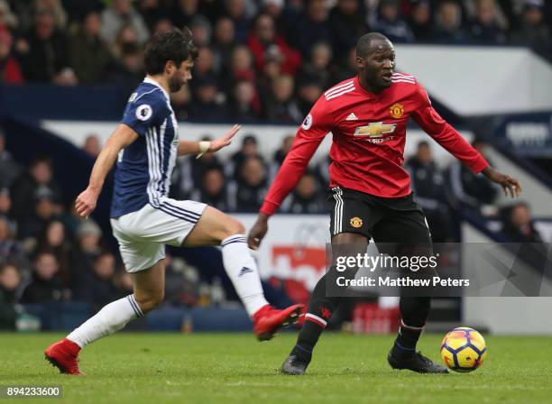 Romelu Lukaku of Manchester United in action with Claudio Yacob of West Bromwich Albion during the Premier League match between West Bromwich Albion...