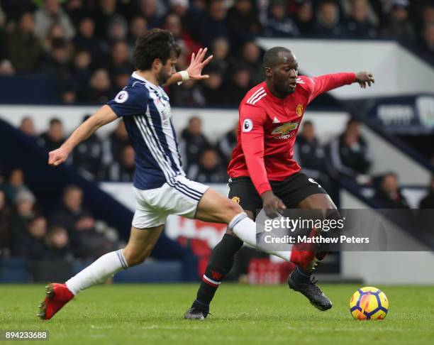 Romelu Lukaku of Manchester United in action with Claudio Yacob of West Bromwich Albion during the Premier League match between West Bromwich Albion...