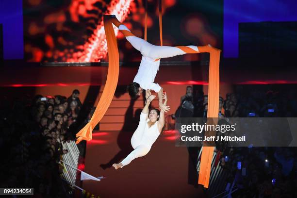 Acrobats perform during the Ciudadanos party's second rally of the weekend ahead of the forthcoming Catalan parliamentary election on December 17,...