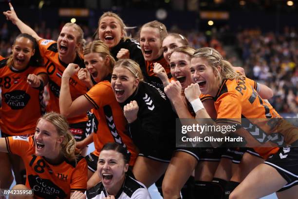 Team of Netherlands celebrate after the IHF Women's Handball World Championship 3rd place match between Netherlands and Sweden at Barclaycard Arena...