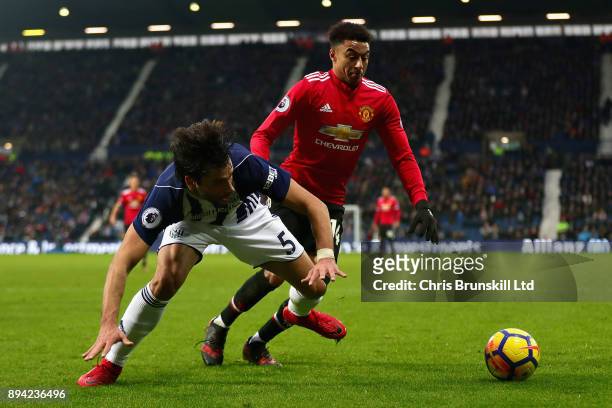 Jesse Lingard of Manchester United and Claudio Yacob of West Bromwich Albion in action during the Premier League match between West Bromwich Albion...