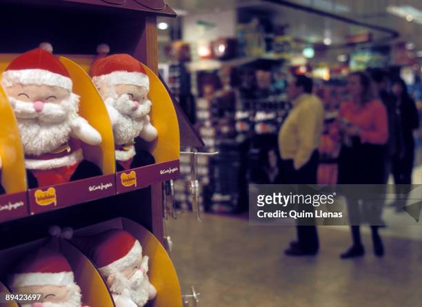 Madrid, Spain. Shopping centres like 'El Corte Ingles', prepared for the Christmas season decorating their shops and steppeding up the stocks of the...